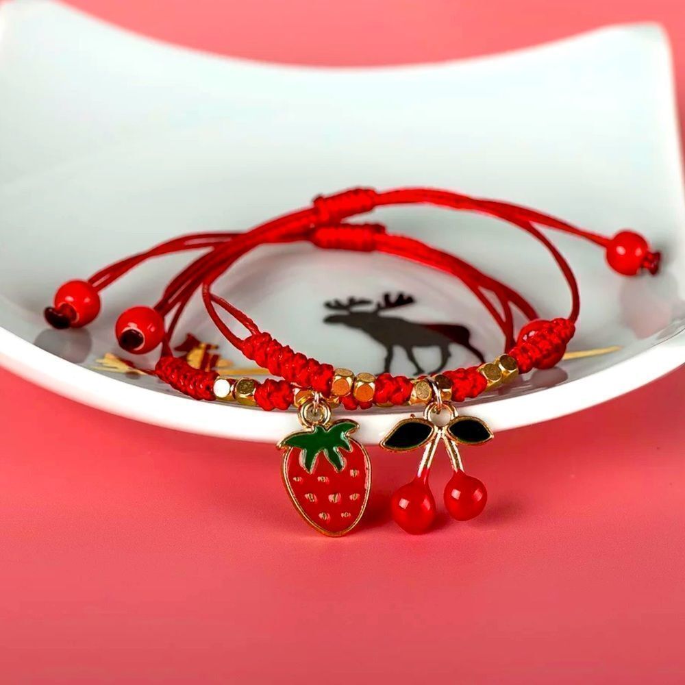 2 ADJUSTABLE BEADED, GLAZED CHARM, CORDED BRACELETS‎